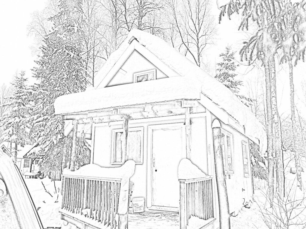 Black and White picture of a small cabin covered in snow and nestled in the trees.